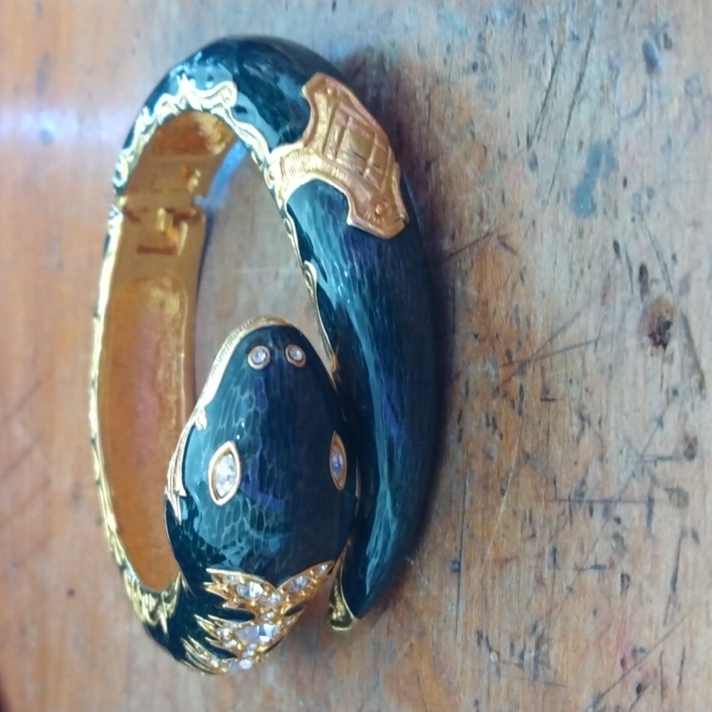 Joan Rivers snake bracelet